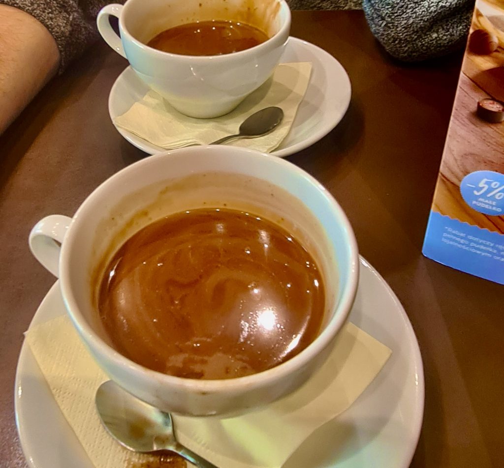Two cups of hot chocolate.