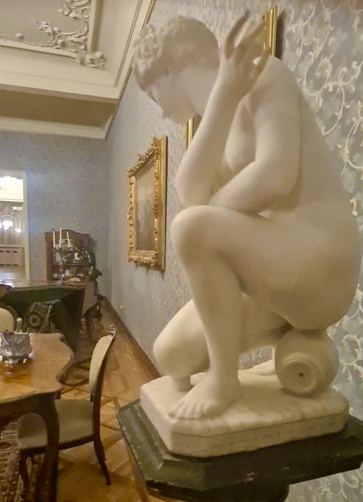 A statue of a woman sitting down