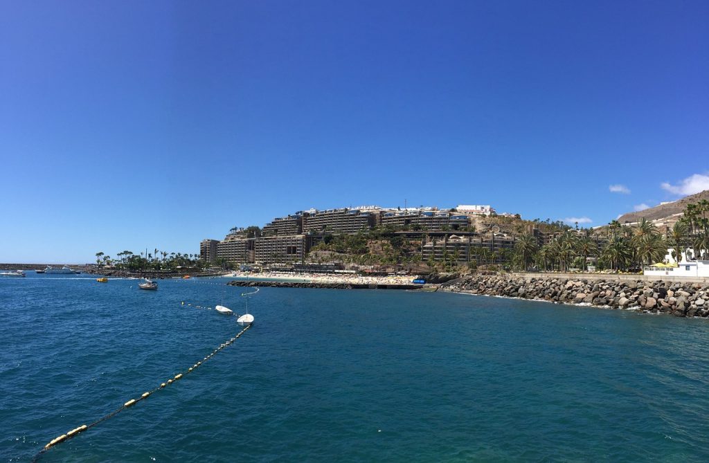 A body of water with buildings on the side